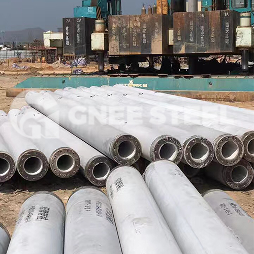 What are steel pipe piles?
